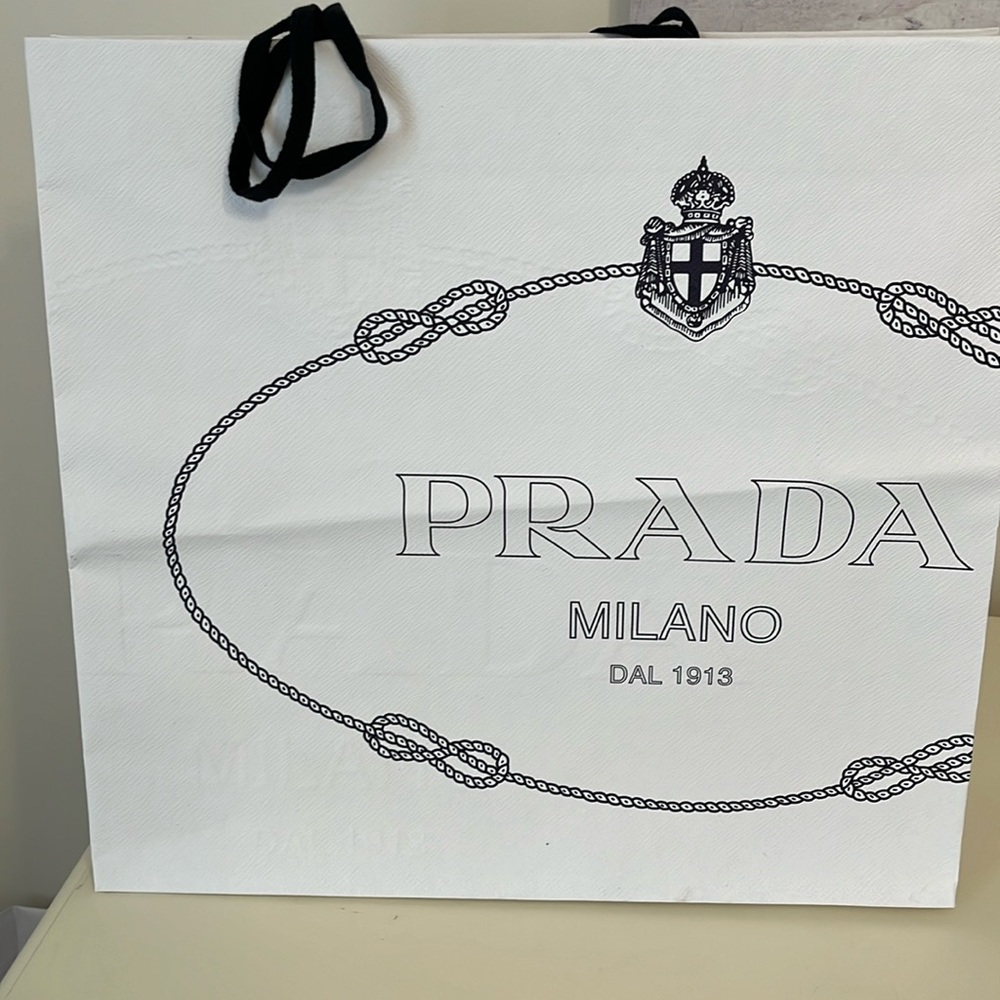 Prada shopping bag with Prada ribbon. Straight from store in Milan.